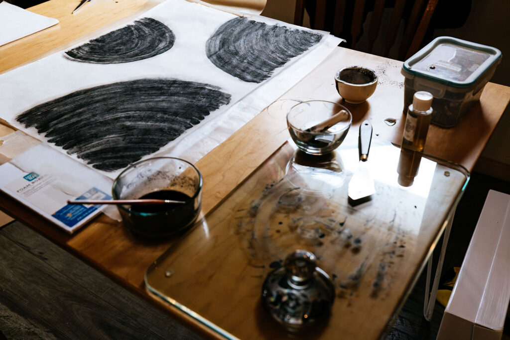 Workspace used for creating ink and paint from wildfire ash
